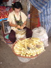 Preparing the corn for sale at the market