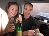 Gini and Paul drinking some sparkles in the Limmo on the way to the V Festival.
