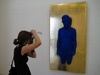 He also painted this poor naked amutee blue and stuck him on a sheet  
of gold.