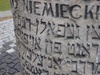 Warsaw: Hebrew on the memorial piece to mark a house in the upraising in Warsaw