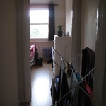 The entrance and laundry to our room