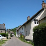 Many thatched cottages all in a row
