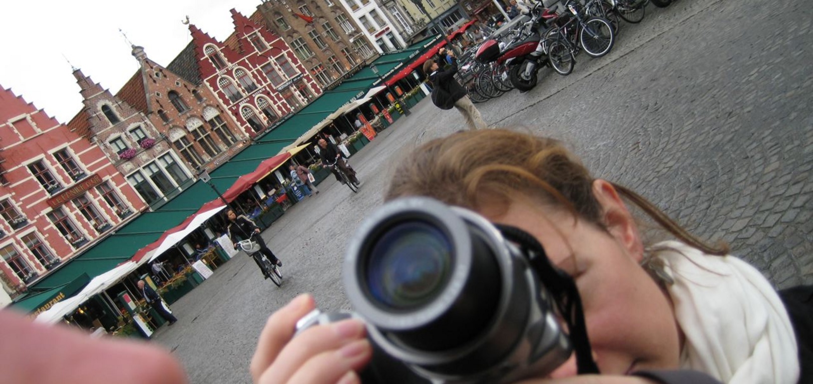 Yee gads there's a giant nose trying to destroy Bruges main square!