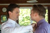 James helps with Tom's tie on the big day!