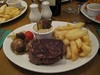 Well worth the wait - a massive Angus Fillet steak with large chips and a haggis sauce.