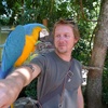 Tom makes a new heavy scratchy colourful friend at Parque das Aves near Foz do Iguacu, Brazil.