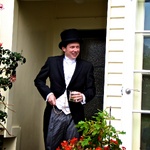 Tom posing at the Pecks front door