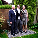 A happy groom with Mum and Dad