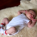 Snoozing on the sheepskin