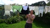Dad hangs out the washing. So many small bits and pieces.