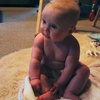 Sitting pretty. Only lasts a few seconds at a time, but she sure looks cute before she topples.