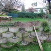 Backyard Pano #1. Retaining wall number 1 is complete, a muddy mess remains. A deck at this stage feels a long way off.