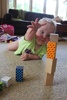 Olive's new game, we build the towers and she knocks them over!