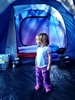 Violet checking out our tent