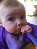 Our little muncher. Loves anything which is sweet. Drops her spoon when more is on its way. Seems to be enjoying eating!