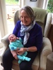 Cuddles with Nan. 3 weeks old and still a happy little sleepy baby. May it last!