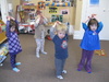 Olive doing the Pigeon song at Play Group. My Pigeon House My pigeon house I open wide And set my pigeons free. They fly so high they touch the sky And light on the tallest trees. And when they return from their merry flight I shut the door and I say goodnight. Coo roo, coo roo, coo roo, coo roo.