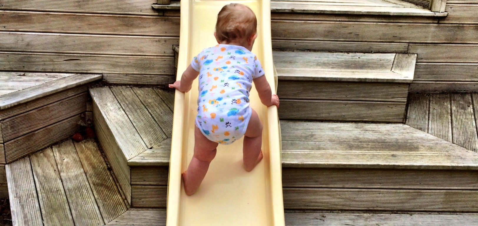 Iriee Ann who is on a mission to explore! It took her seconds to get up the slide! I was amazed at her grip, then of course Olive had to do it. Iriee loves standing at the bath on either side which makes us a bit nervous.