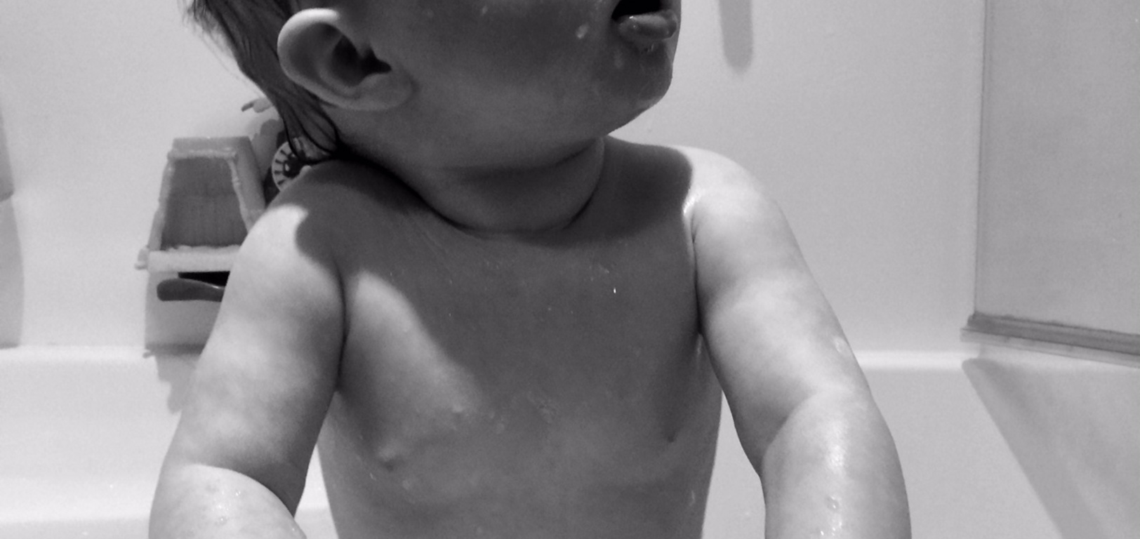 Iriee Ann who is on a mission to explore! It took her seconds to get up the slide! I was amazed at her grip, then of course Olive had to do it. Iriee loves standing at the bath on either side which makes us a bit nervous.