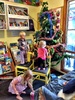 At kpc today we had a fairy help decorate the Christmas tree! Iris enjoyed passing the dropped ornaments up to olive. Iris really likes hanging with the big kids, loves being part of anything. The best play is always after session... Funny that.