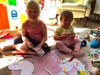 Olive and poppy drawing their birds.