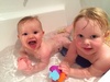 Iris crawls around in the bath and is very confident in there. Olive enjoys bath time once more with little sis.
