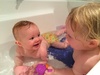 Iris crawls around in the bath and is very confident in there. Olive enjoys bath time once more with little sis.