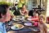 Dinner in the nude after a paddling pool bath with mummy.
