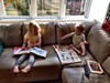 Iris loves copying big sister. In this instance it is lovely to see them both reading books.