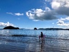 Making the most of a beautiful morning at Paihia Beach.