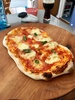 First try at sourdough pizza... a resounding success! Need a few tricks to get it working in our average oven though.