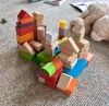 Iris is always busy busy, often leaving a trail of destruction in her wake. This time, however, she created an amazing little castle town from the blocks she nabbed from Junipers room.