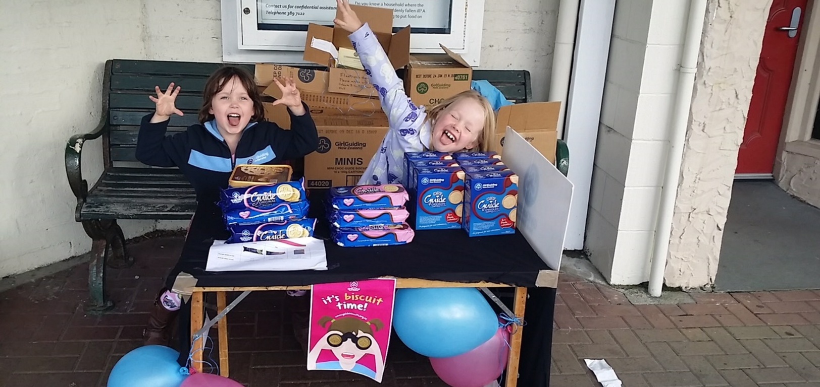 The good old girl guiding biscuits, sold by these two crazy kids!