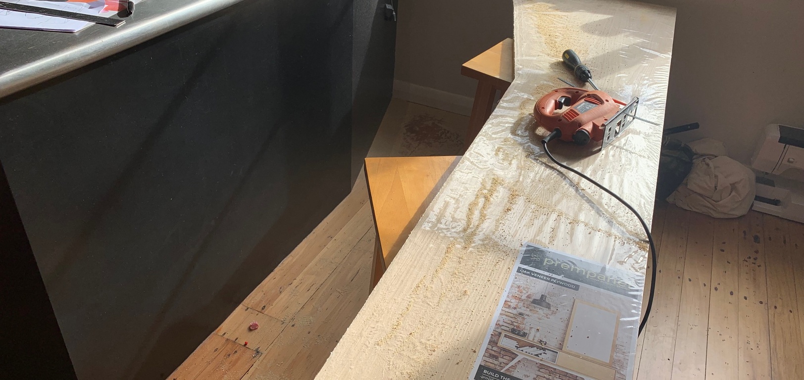A $60 bargain piece of oak ply wood and boom we have a breakfast bar! Life changing!