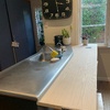 A $60 bargain piece of oak ply wood and boom we have a breakfast bar! Life changing!