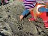 TN Petone beach this week, loved writing her name and finding & buried treasure.