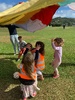 KPC Tamariki Nui: at Ben burn park, painting boxes and sliding down the hills, ball and parachute play.