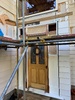 Finished the front entrance framing, Tom put the old door in for a temporary door until the old new one arrives