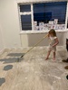 We used old paint (nandads rejected paint) to seal the plywood floor to make it nicer to walk on until carpet time.