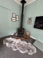 Trying to make one last push on the small paint jobs outside. Entrance is starting to look finished! Zobie has enjoyed the lamb skin rug and we managed a date night!