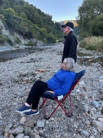 Bbq with fire on the riverbed.