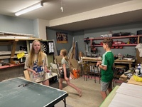 Cousins sleepover, forest school on a rainy day. Followed by robot challenge in Lego.